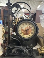 Cast iron (?) black hanging Victorian clock