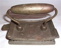 Vintage cast iron fluter iron.