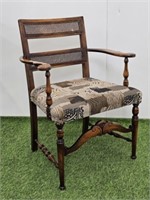 EARLY CARVED CANE BACK CHAIR