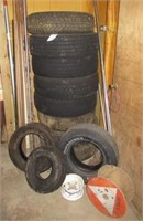 Collection of various size tires with metal