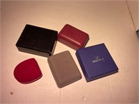 five small empty jewelry boxes