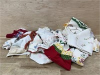 Box of vintage embroidered linens and doilies