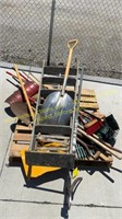 Wood ladder , shovels, brooms