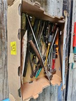 flat with hammers, rubber mallets, breaker bars,