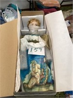 Porcelain angel doll still wrapped in box