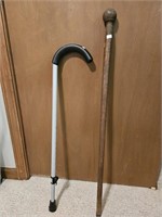 Walking pains. 1 is adjustable, 1 is wood with