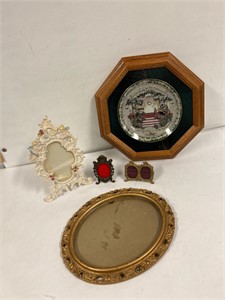 Assorted frames and a plate