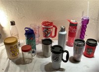 Assortment of mugs, glasses, water bottles