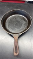 Cast iron skillet stamped 6 and D measure 9.5 in