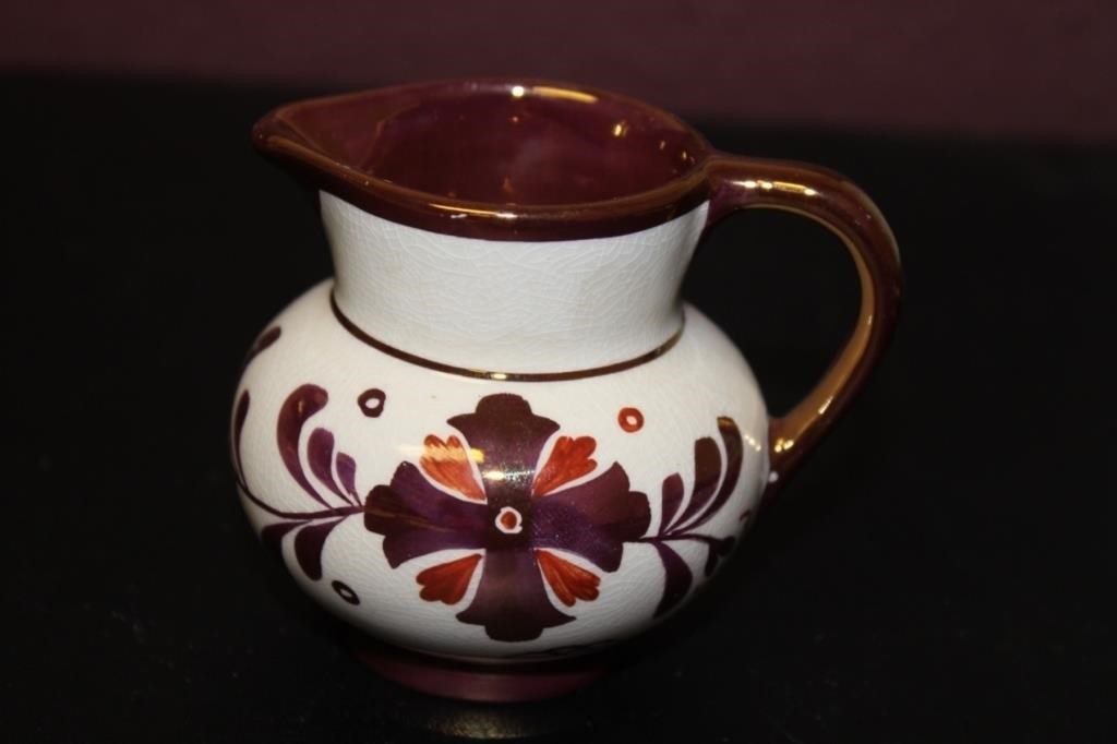 An Old Castle Copper Ceramic Luster Creamer