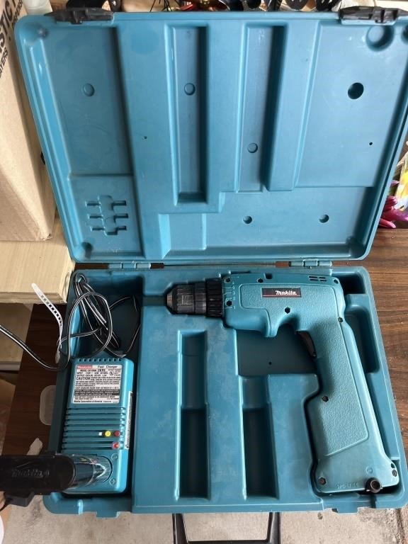 Makita drill battery is on charger