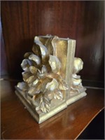 Pair of heavy gold color bookends