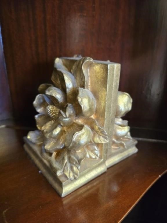 Pair of heavy gold color bookends