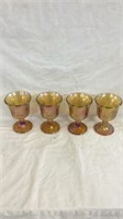 Four Amber carnival glass goblets