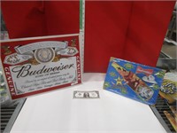 Two Budweiser signs