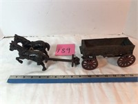 Arcade cast iron-marked McCormick Deering on wagon