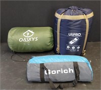 2 SLEEPING BAGS AND A TENT