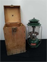 Vintage 1968 Coleman lantern with wooden carry