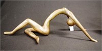 Brass recumbent nude figure