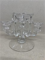 Glass candleholder with prisms