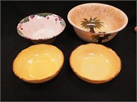 Four ceramic painted bowls from 10" to 15"