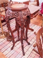 Oriental highly carved octagonal plant stand