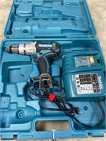 Makita driver drill with charger, no battery.