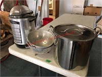 stock pot and colanders