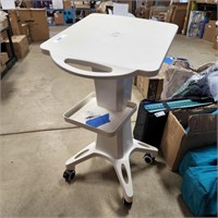 White cart table on wheels