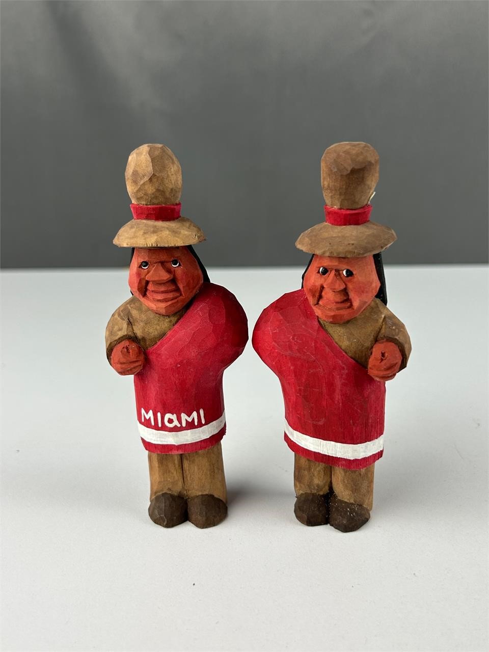 Wooden carved Miami University Indian mascots