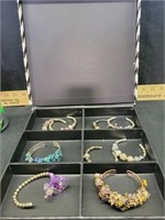 Box of costume bracelets