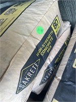 Four bags of new concrete mix