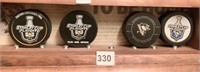 4 NHL HOCKEY PUCKS