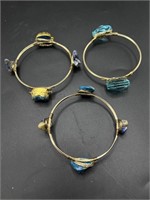 3 gold toned wire wrapped bangle bracelets in