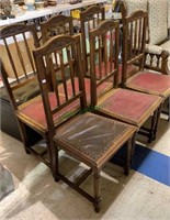 6 matching oak dining chairs with a carved