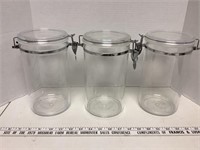 3 plastic canisters with locking lids 9 in