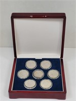 7 Morgan Silver Dollars w/ Hard Case