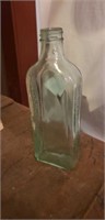 8" vintage medicine bottle 
Light aqua, the