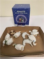 Duck ornaments and peanuts musical snow globe