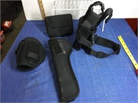 One thigh holster.  2 holsters.  Ammo bag