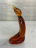 Hand blown penguin amber glass