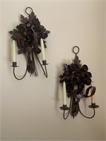 Pair of wall sconces with candles, metal flowers