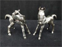 Pair of metal pony figurines