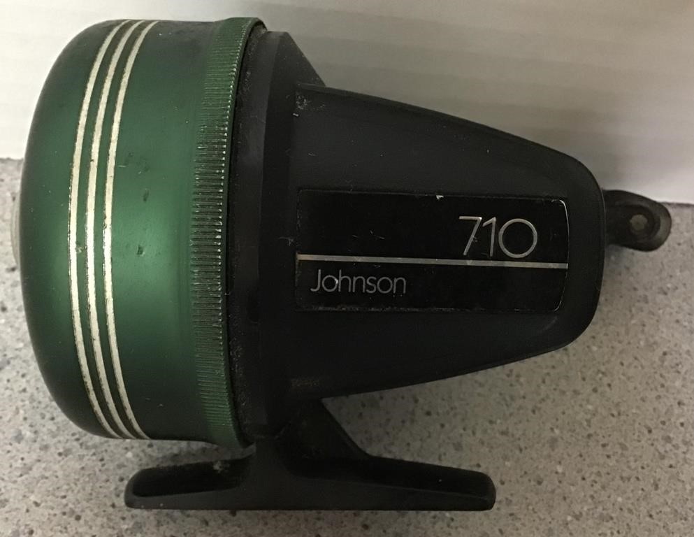 JOHNSON 710 GRAPHINE FISHING REEL  The Oaks Of Montgomery Auctions, LLC
