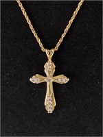 18” 14KT gold chain with cross pendant.