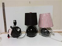 3 round black lamps