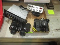 Flat w/CB, binoculars, camera, car radio