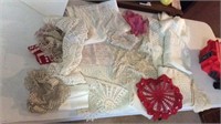 Assorted doilies and curtains