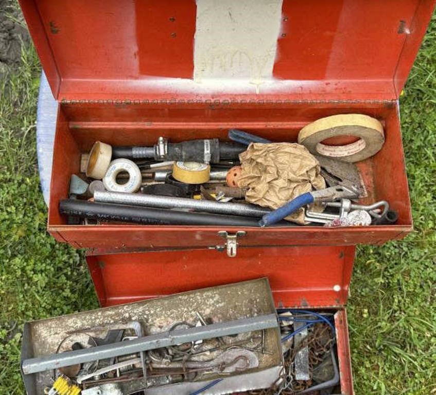 Pair of red tool boxes and contents