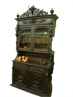 19th Century intricately carved oak hunt cabinet